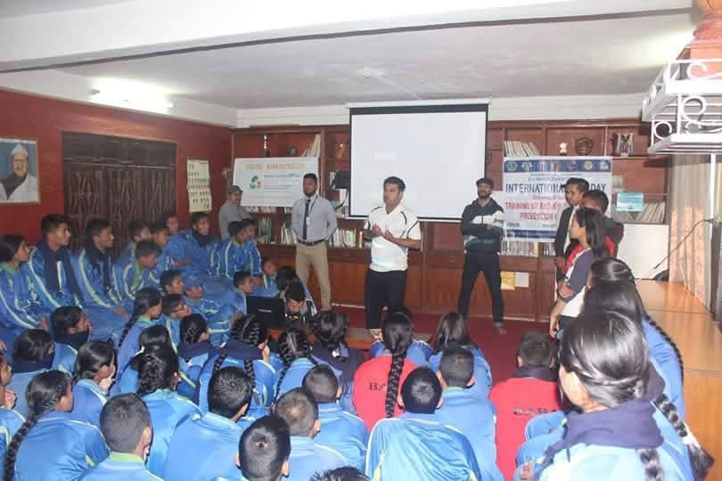 Community gathering with speaker and audience
