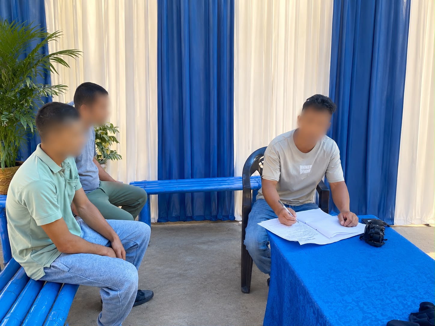 Quiet one-on-one counseling session in warm therapy room